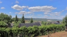 Stavebn� pozemek s rodinn�m domem v Le�anech